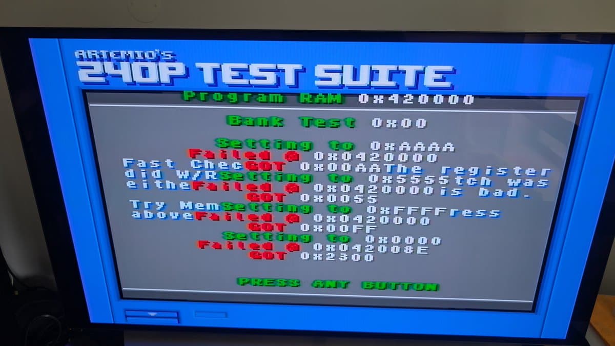 Sega Wondermega 240P test suite showing Program RAM failure at 0x420000 and multiple failed diagnostics in red text.
