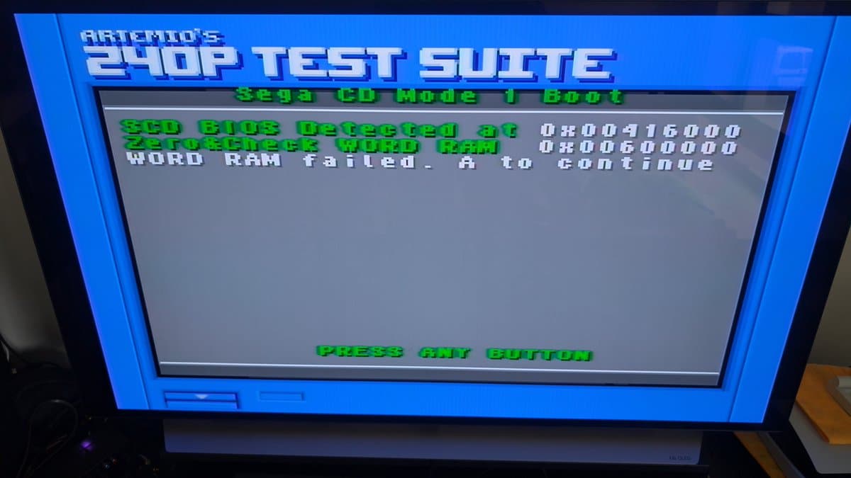Artemis's 240p Test Suite showing Sega CD Mode 1 boot diagnostics with RAM errors detected at addresses 0x00491600 and 0x00600000, Word RAM failed test prompt.