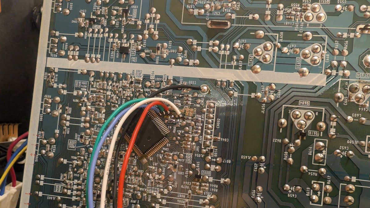 Soldering RGB mod wires (green, blue, white, red, black) onto Sony PVM-14L1 motherboard during installation of Martin Hejnfelt's RGB mod design.