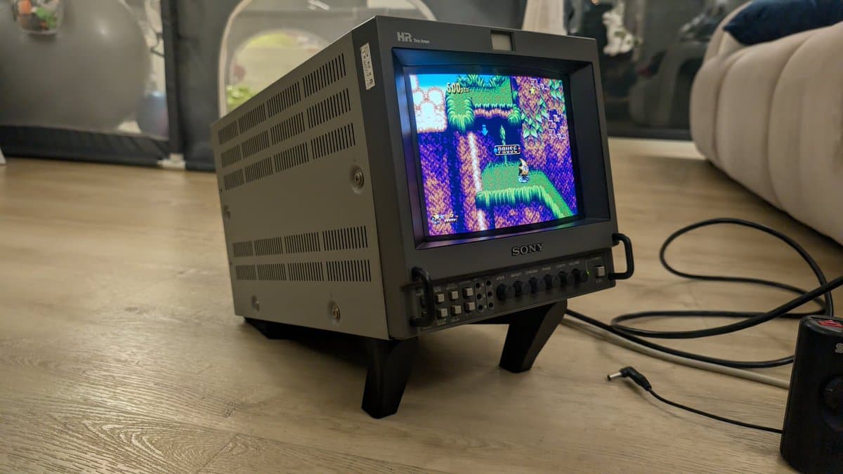Sony PVM-9045QD on 3D printed stand displaying Sonic the Hedgehog, showing restored monitor after PSU, neck board, and deflection board repairs.