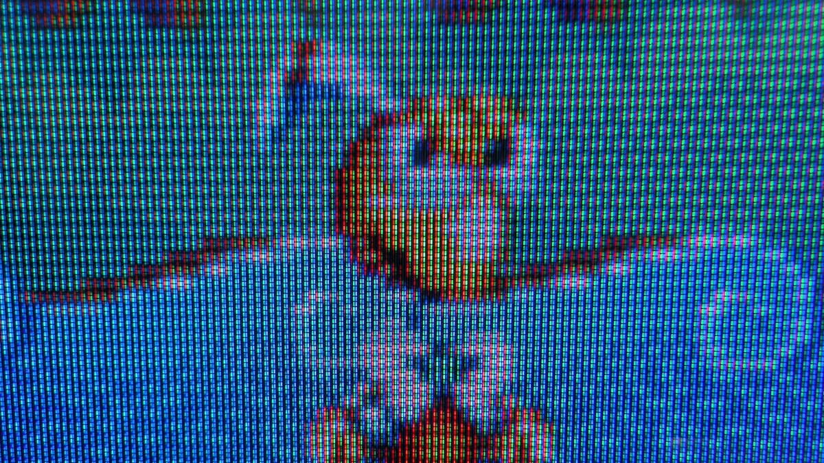 Close-up of B&O Beovision 1 CRT neck board showing yellow plug disconnected from Velocity Scan Modulation circuit; visible solder joints and component traces.